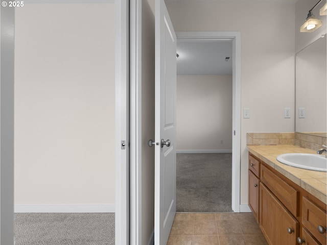 bathroom featuring tile patterned floors and vanity