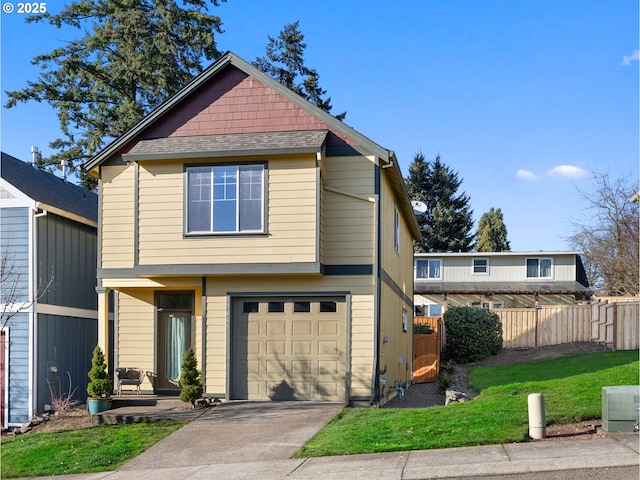 front of property featuring a garage and a front lawn