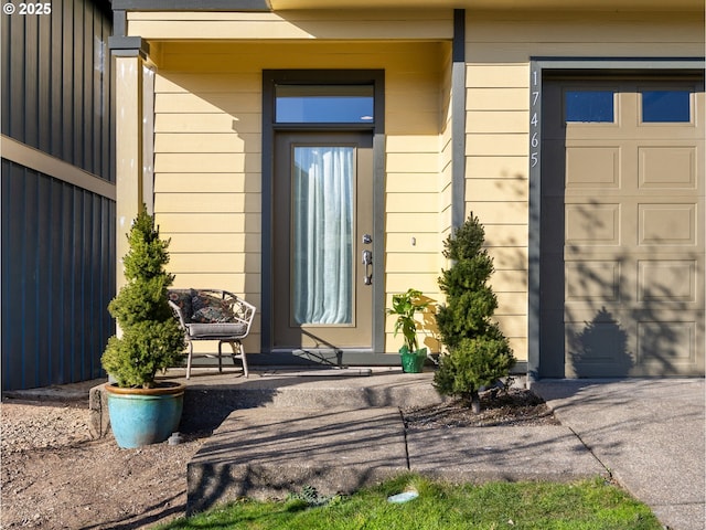 property entrance with a garage