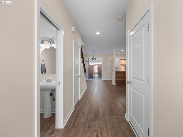 corridor featuring wood-type flooring