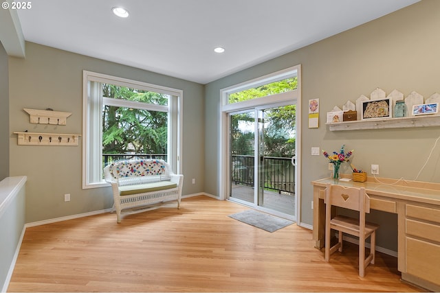 doorway to outside featuring recessed lighting, light wood-style floors, and baseboards