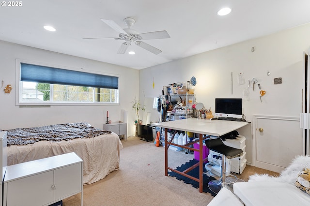 bedroom featuring recessed lighting, light colored carpet, and a ceiling fan