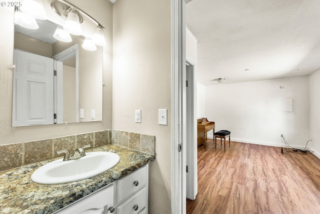 9304 NE 96th St, Vancouver, WA 98662 - bathroom featuring wood finished floors and vanity