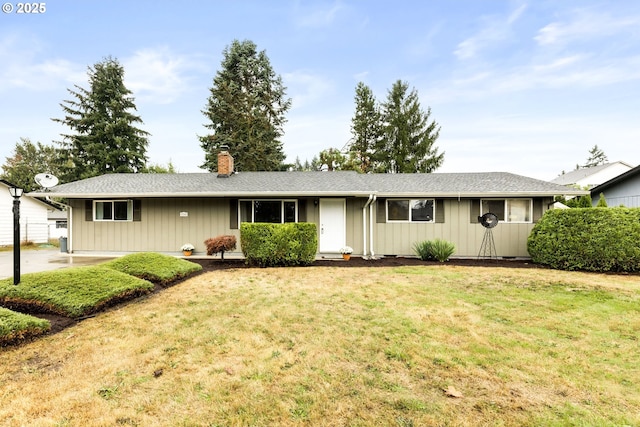 9304 NE 96th St, Vancouver, WA 98662 - single story home with a chimney, a front yard, and board and batten siding