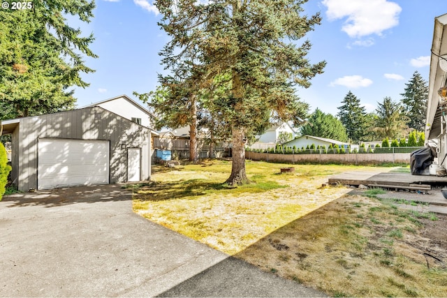 9304 NE 96th St, Vancouver, WA 98662 - view of yard featuring an outbuilding, a wooden deck, and driveway