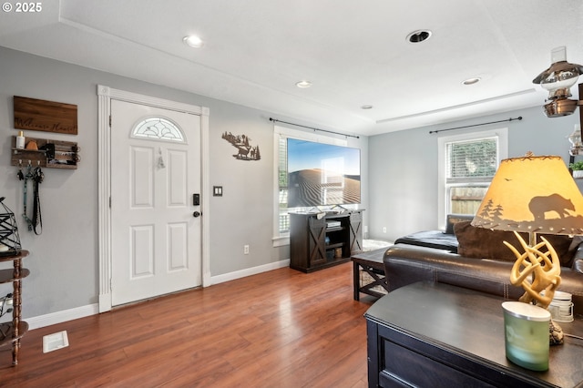 entryway with hardwood / wood-style flooring