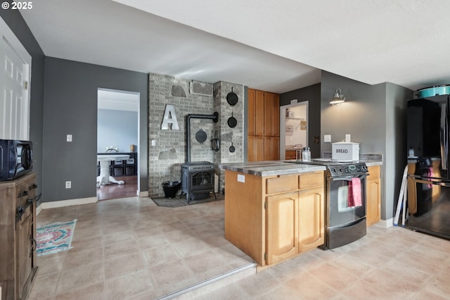 kitchen with kitchen peninsula and black appliances