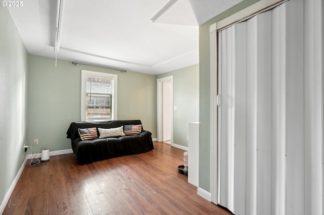 living area featuring hardwood / wood-style floors