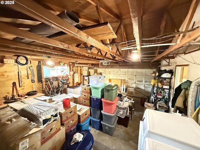 basement featuring washing machine and dryer