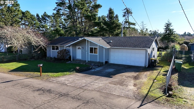 single story home featuring a front yard and a garage