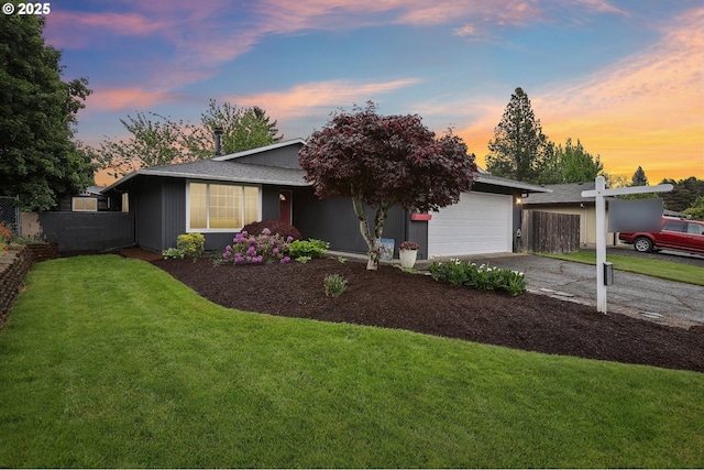 view of front facade with an attached garage and concrete driveway