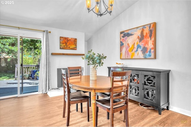 18365 SW Springfield St, Beaverton, OR 97078 - dining room featuring a chandelier and wood finished floors