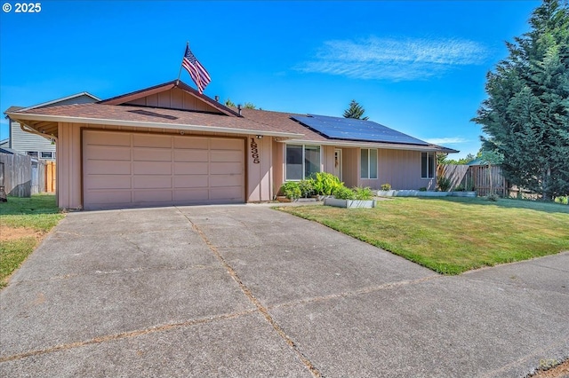 18365 SW Springfield St, Beaverton, OR 97078 - ranch-style home featuring solar panels, an attached garage, and driveway