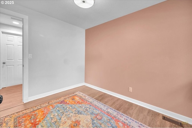 18365 SW Springfield St, Beaverton, OR 97078 - empty room with wood finished floors, baseboards, and recessed lighting