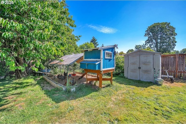 18365 SW Springfield St, Beaverton, OR 97078 - view of yard featuring exterior structure and an outdoor structure