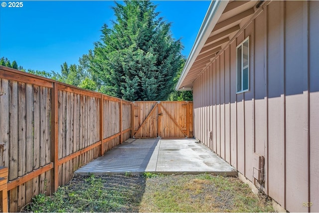 18365 SW Springfield St, Beaverton, OR 97078 - fenced backyard with a patio area and a gate