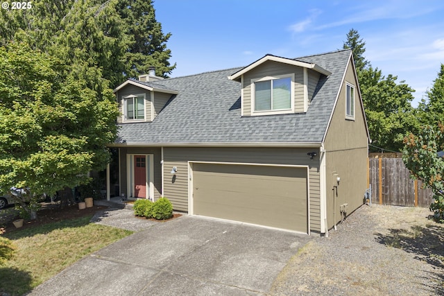 13527 SW Ashbury Ln, Portland, OR 97223 - view of front of house featuring a shingled roof and driveway