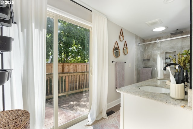 13527 SW Ashbury Ln, Portland, OR 97223 - bathroom featuring tiled shower and vanity