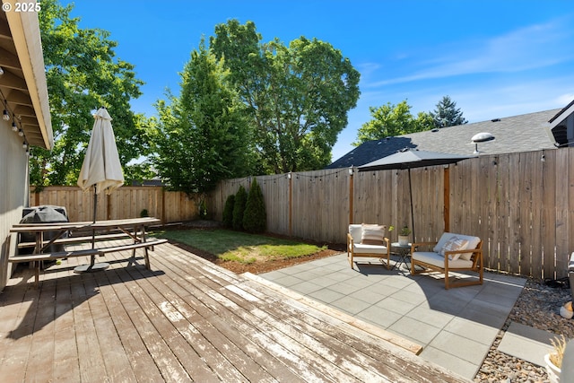 13527 SW Ashbury Ln, Portland, OR 97223 - wooden terrace featuring a fenced backyard, a patio, and a grill
