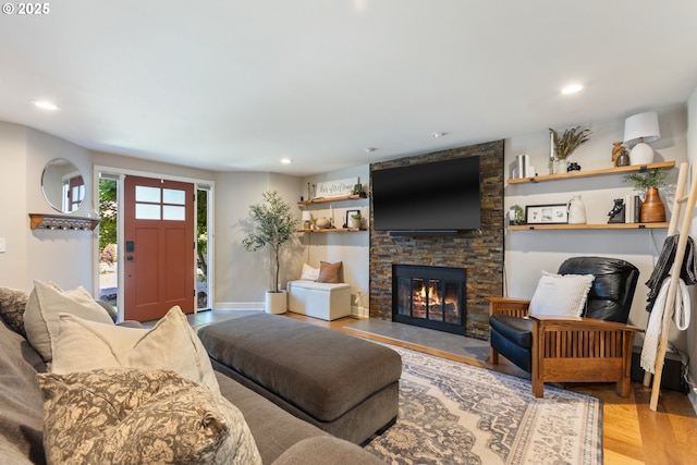 13527 SW Ashbury Ln, Portland, OR 97223 - living room with wood finished floors, a stone fireplace, and recessed lighting