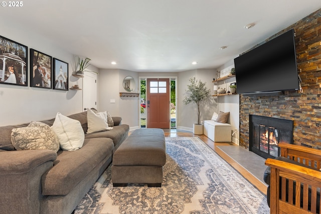 13527 SW Ashbury Ln, Portland, OR 97223 - living area with wood finished floors, a fireplace, and recessed lighting