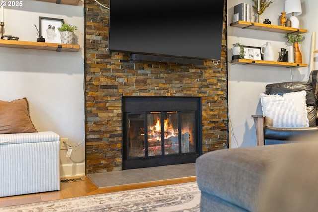 13527 SW Ashbury Ln, Portland, OR 97223 - living area with wood finished floors and a glass covered fireplace