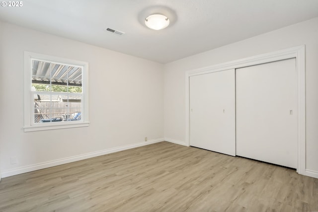 2702 Fairmount Ave, Vancouver, WA 98661 - unfurnished bedroom with light wood-type flooring, a closet, and baseboards