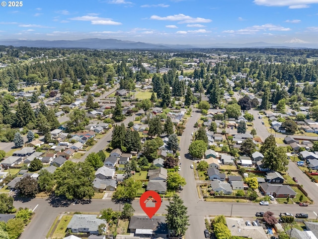 2702 Fairmount Ave, Vancouver, WA 98661 - aerial overview of property's location with a mountain backdrop and nearby suburban area