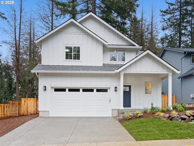 view of front of property with a garage