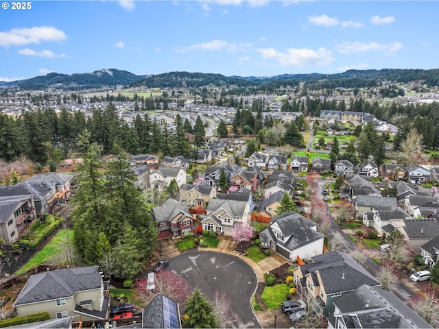 bird's eye view with a mountain view and a residential view