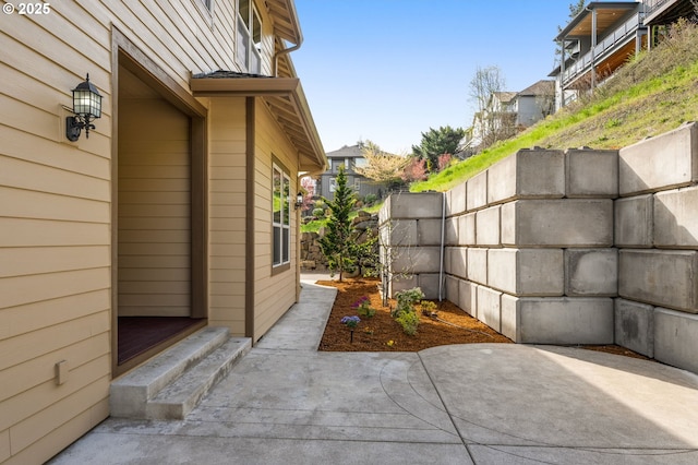 4018 NW Riggs Dr, Portland, OR 97229 - view of home's exterior with a patio area and fence