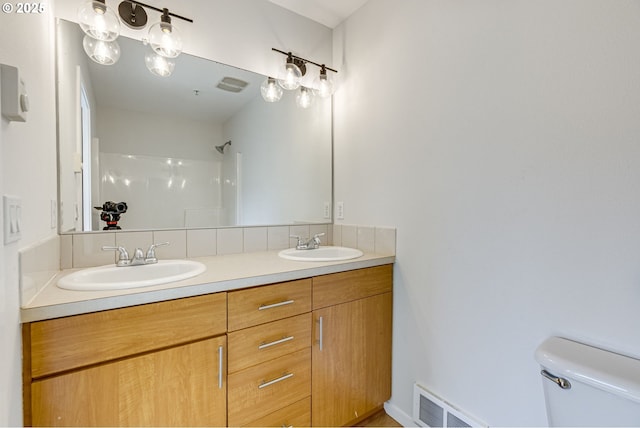 8522 N Central St Unit 17-1, Portland, OR 97203 - bathroom with toilet, double vanity, and a shower