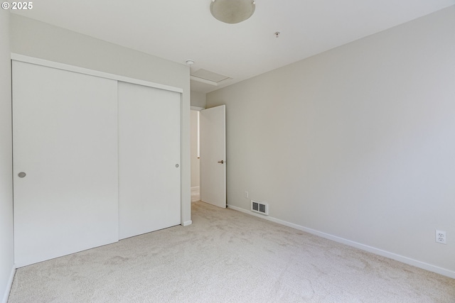 8522 N Central St Unit 17-1, Portland, OR 97203 - unfurnished bedroom featuring carpet floors, a closet, attic access, and baseboards