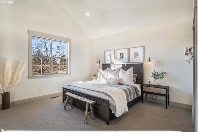 carpeted bedroom featuring high vaulted ceiling