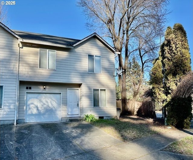 view of front of property featuring a garage