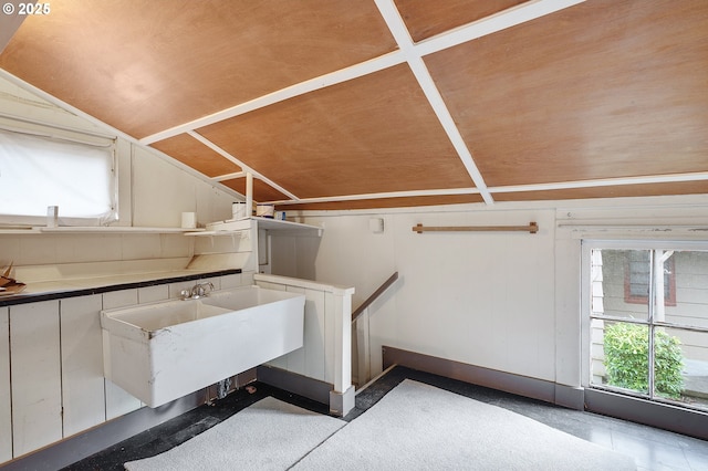 clothes washing area with a sink