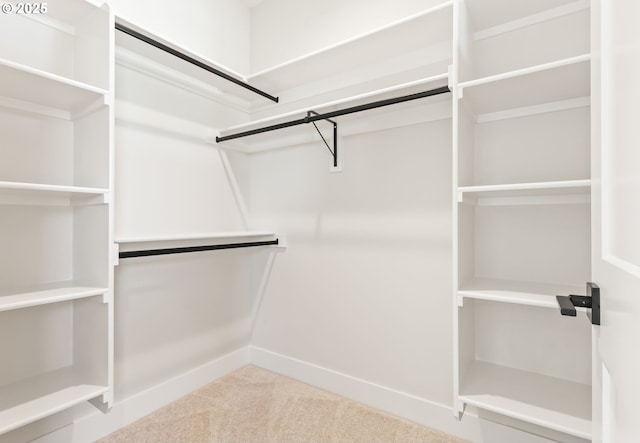 648 Parker Loop, Silverton, OR 97381 - walk in closet featuring carpet floors