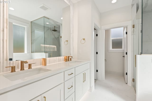 648 Parker Loop, Silverton, OR 97381 - full bath featuring a marble finish shower, recessed lighting, marble finish flooring, double vanity, and baseboards