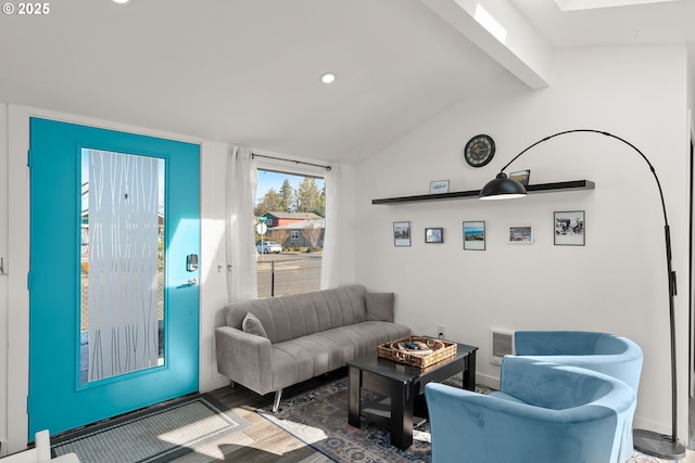 living room with dark wood-type flooring and lofted ceiling with beams