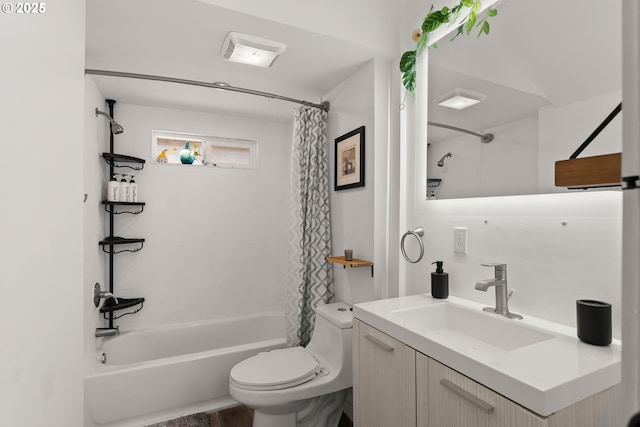 full bathroom with vanity, toilet, and shower / bath combo with shower curtain