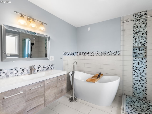 13145 SW 61st Ave, Portland, OR 97219 - bathroom featuring tile walls, a soaking tub, a stall shower, vanity, and tile patterned floors