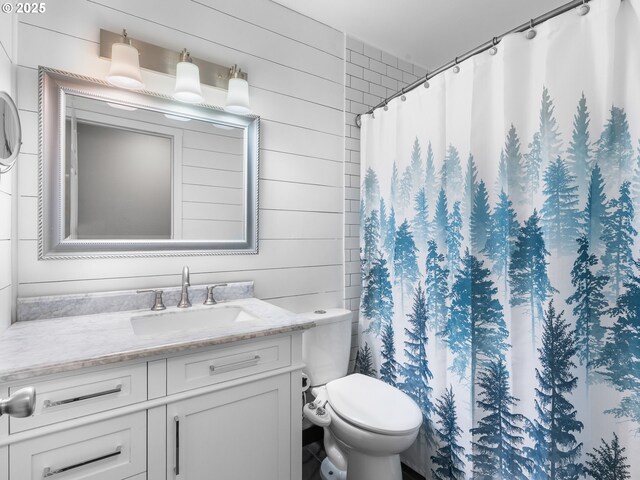 13145 SW 61st Ave, Portland, OR 97219 - full bathroom featuring vanity, toilet, wood walls, and curtained shower