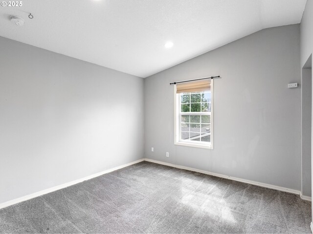 13145 SW 61st Ave, Portland, OR 97219 - carpeted empty room featuring lofted ceiling, baseboards, a smoke detector, and recessed lighting