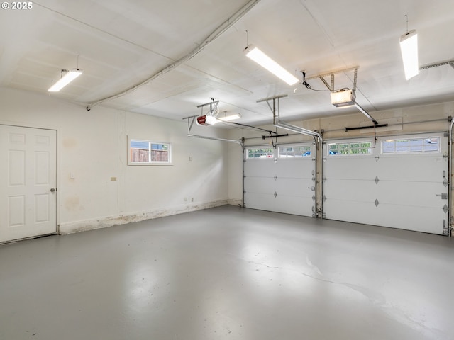 13145 SW 61st Ave, Portland, OR 97219 - garage featuring a garage door opener