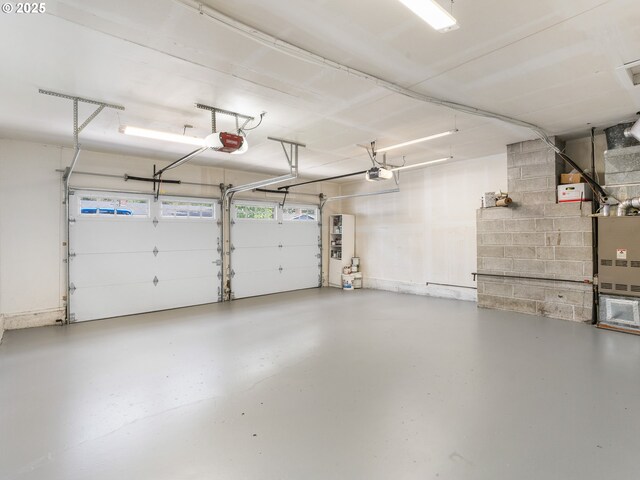 13145 SW 61st Ave, Portland, OR 97219 - garage featuring a garage door opener