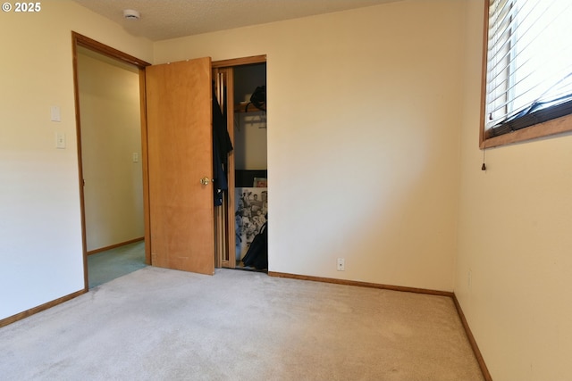 5902 NE 11th Ave, Portland, OR 97211 - unfurnished bedroom with carpet, a closet, and baseboards