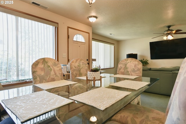 5902 NE 11th Ave, Portland, OR 97211 - dining space featuring a textured ceiling and a ceiling fan