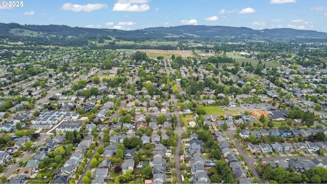 403 W Oxford St, Newberg, OR 97132 - aerial overview of property's location featuring a mountainous background and nearby suburban area