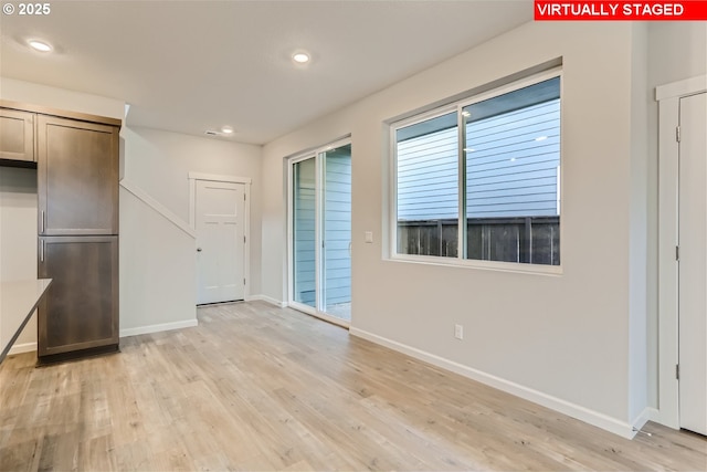 interior space with light hardwood / wood-style flooring