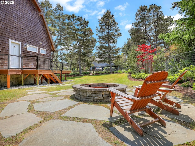 652 Nita Ave, Gearhart, OR 97138 - view of patio / terrace with a fire pit, a deck, and stairway